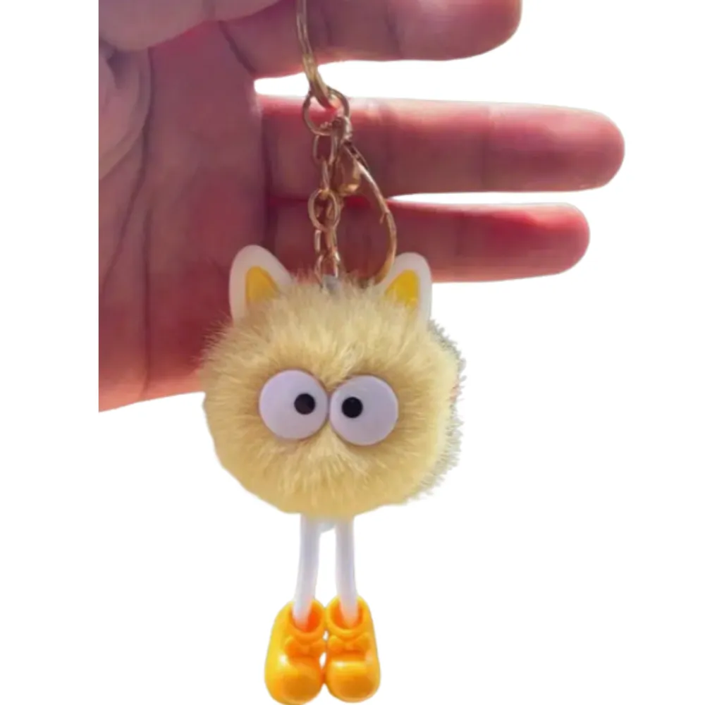 FREAKING ADORABLE POM POM WITH EYES & LEGS CHARACTER KEYCHAINS